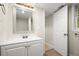 Bathroom with a vanity, chrome faucet and mirror at 505 Samaritan Dr, Cumming, GA 30040