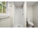 Bathroom featuring a white shower with a window, providing natural light at 505 Samaritan Dr, Cumming, GA 30040