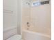 Bathroom features a tub, a shower and a window that offers natural light at 5137 Allison Way, Sugar Hill, GA 30518