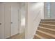 Inviting entryway with carpeted stairs leading to the upper level of the home at 5137 Allison Way, Sugar Hill, GA 30518