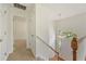 Bright foyer featuring stairs with wood and white railings, and a pendant light at 5137 Allison Way, Sugar Hill, GA 30518