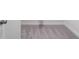 Neutral tone carpeting with door and baseboard at 5415 Trescott Path, Cumming, GA 30028