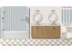 Guest bathroom selections featuring tile in diamond pattern at 1111 Moreland Se Pl, Atlanta, GA 30316