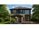 Modern two-story home featuring large windows and a well-manicured front lawn at 1111 Moreland Se Pl, Atlanta, GA 30316