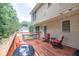 Spacious wooden deck with outdoor dining, seating, and grill at 1350 Rivershyre Pkwy, Lawrenceville, GA 30043