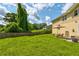 Spacious backyard with lush green grass and patio area, perfect for outdoor entertaining and relaxation at 1848 Winthrop Se Dr, Atlanta, GA 30316