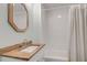 Bathroom with vanity, tub, and shower with white subway tiles at 1848 Winthrop Se Dr, Atlanta, GA 30316