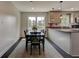 Cozy dining area featuring a table with chairs, overhead lighting, and a view to the kitchen at 1848 Winthrop Se Dr, Atlanta, GA 30316