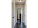 Hallway with a view into the office, with white doors and dark hardware at 1848 Winthrop Se Dr, Atlanta, GA 30316