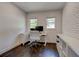 Home office with white furniture, hardwood floors, and natural light at 1848 Winthrop Se Dr, Atlanta, GA 30316