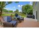 Charming outdoor deck with seating and views of the expansive, well-manicured backyard at 3635 Bardfield Ct, Cumming, GA 30041
