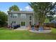 Backyard with a patio and deck, providing a welcoming space for outdoor activities and entertaining at 3635 Bardfield Ct, Cumming, GA 30041