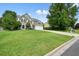 Well-maintained home with a spacious lawn and two-car garage, perfect for suburban living at 3635 Bardfield Ct, Cumming, GA 30041