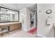 Bathroom with granite counters, large mirror, and decoratively painted accents at 1720 Monarch Ct, Cumming, GA 30041