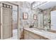 Bathroom featuring patterned wallpaper, granite counters and tile backsplash at 1720 Monarch Ct, Cumming, GA 30041