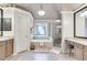 Spacious bathroom featuring a soaking tub, glass-enclosed shower, and and sinks at 1720 Monarch Ct, Cumming, GA 30041