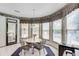 Charming breakfast nook with large windows providing abundant natural light and a cozy seating area at 1720 Monarch Ct, Cumming, GA 30041