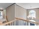 Open entryway with a view of the front door, chandelier, and staircase at 1720 Monarch Ct, Cumming, GA 30041