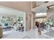 Inviting foyer with views into a living room and sitting area, offering a welcoming entrance and elegant transition at 1720 Monarch Ct, Cumming, GA 30041