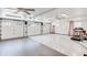 Spacious three-car garage with high ceilings and ceiling fans at 1720 Monarch Ct, Cumming, GA 30041