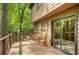 Relax on this spacious back deck with patio table and chairs and glass sliding door at 2269 Sparrow Ridge Ne Dr, Marietta, GA 30066