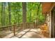 Enjoy this wooden back deck with metal cable railing and plenty of room to relax and enjoy the view at 2269 Sparrow Ridge Ne Dr, Marietta, GA 30066