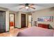 Spacious bedroom with views into the ensuite bathroom and an additional bedroom at 2269 Sparrow Ridge Ne Dr, Marietta, GA 30066