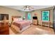 Comfortable bedroom with light wood floors, multiple windows and natural light at 2269 Sparrow Ridge Ne Dr, Marietta, GA 30066