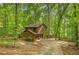Charming two-story home nestled in a lush, wooded setting with a private driveway and two-car garage at 2269 Sparrow Ridge Ne Dr, Marietta, GA 30066