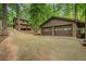 Detached two-car garage with a carport is connected by a long driveway at 2269 Sparrow Ridge Ne Dr, Marietta, GA 30066