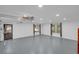 This brightly lit garage with gray epoxy floors also has lots of natural light at 2269 Sparrow Ridge Ne Dr, Marietta, GA 30066