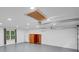 The interior of the garage features a gray epoxy floor and an abundance of room for storage at 2269 Sparrow Ridge Ne Dr, Marietta, GA 30066