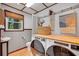Laundry room with washer, dryer, sink, and a window that provides an abundance of natural light at 2269 Sparrow Ridge Ne Dr, Marietta, GA 30066