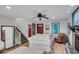 Bright living room with hardwood floors, comfortable furniture, and a view of the front entrance at 2269 Sparrow Ridge Ne Dr, Marietta, GA 30066