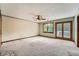Bedroom featuring neutral walls, ceiling fan, and door to outdoor deck at 2538 Morgan Lake Ne Dr, Marietta, GA 30066
