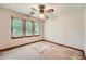 Bedroom featuring three windows providing natural light and ceiling fan at 2538 Morgan Lake Ne Dr, Marietta, GA 30066