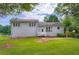 Charming two-story home with a spacious lawn and lush green surroundings at 2538 Morgan Lake Ne Dr, Marietta, GA 30066