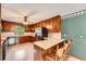 Kitchen with wooden cabinets and a stainless steel refrigerator at 2538 Morgan Lake Ne Dr, Marietta, GA 30066