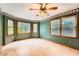Bright living room featuring beautiful wood-trimmed windows and new light wood flooring at 2538 Morgan Lake Ne Dr, Marietta, GA 30066