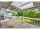 Covered porch with a ceiling fan overlooking the backyard at 2538 Morgan Lake Ne Dr, Marietta, GA 30066