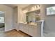 Well-appointed bathroom featuring double sinks, lots of counter space, and wood-look flooring at 4056 Friendship Creek Dr, Buford, GA 30519