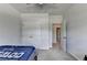 Bedroom with carpet flooring, ceiling fan, large closet and a window at 4056 Friendship Creek Dr, Buford, GA 30519