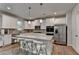 Well-appointed kitchen featuring a large center island and stainless steel appliances at 4056 Friendship Creek Dr, Buford, GA 30519