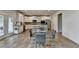 Eat-in kitchen features stainless steel appliances, white cabinets, and granite countertops at 4056 Friendship Creek Dr, Buford, GA 30519
