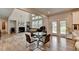 Spacious living room and kitchen, features fireplace, and abundant natural light at 4056 Friendship Creek Dr, Buford, GA 30519