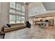 Bright living room with a large window, and an open concept leading to the kitchen at 4056 Friendship Creek Dr, Buford, GA 30519