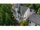 Aerial view of home featuring a deck, and surrounding landscape at 745 Glengate Pl, Atlanta, GA 30328