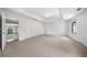 A large, bright bonus room with neutral carpet and an adjacent closet at 745 Glengate Pl, Atlanta, GA 30328