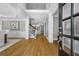 An airy foyer featuring hardwood floors, a staircase, and high ceilings at 745 Glengate Pl, Atlanta, GA 30328