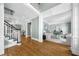 A welcoming living room featuring bright, open spaces and a staircase to the upper floors at 745 Glengate Pl, Atlanta, GA 30328